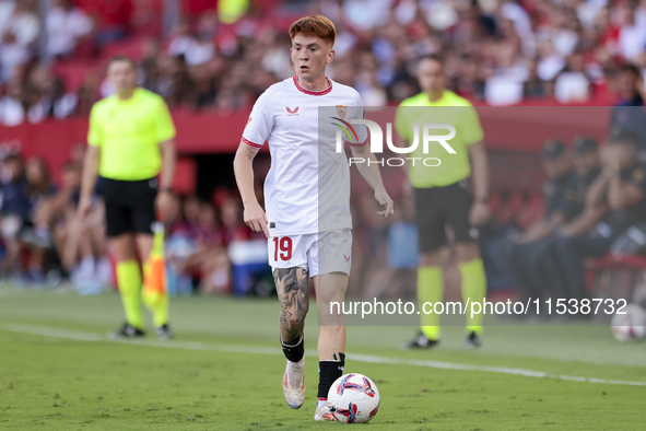 Valentin Barco of Sevilla FC runs with the ball during the La Liga EA Sports match between Sevilla FC and Girona CF at Nuevo Mirandilla in S...