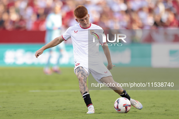 Valentin Barco of Sevilla FC makes a center to the area during the La Liga EA Sports match between Sevilla FC and Girona CF at Nuevo Mirandi...