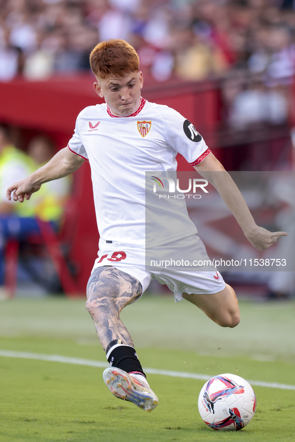 Valentin Barco of Sevilla FC makes a center to the area during the La Liga EA Sports match between Sevilla FC and Girona CF at Nuevo Mirandi...