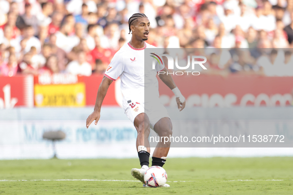 Loic Bade of Sevilla FC passes the ball during the La Liga EA Sports match between Sevilla FC and Girona CF at Nuevo Mirandilla in Seville,...