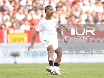 Loic Bade of Sevilla FC passes the ball during the La Liga EA Sports match between Sevilla FC and Girona CF at Nuevo Mirandilla in Seville,...