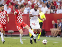 Marcos do Nascimento ''Marcao'' of Sevilla FC battles for the ball during the La Liga EA Sports match between Sevilla FC and Girona CF at Nu...