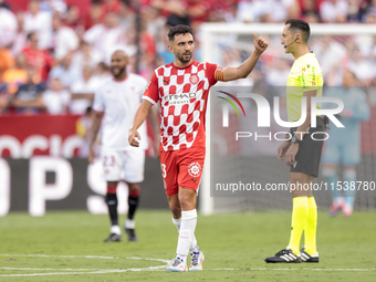 Ivan Martin of Girona FC celebrates a goal during the La Liga EA Sports match between Sevilla FC and Girona CF at Nuevo Mirandilla in Sevill...