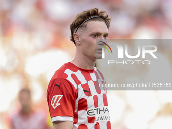 Viktor Tsygankov of Girona FC is in action during the La Liga EA Sports match between Sevilla FC and Girona CF at Nuevo Mirandilla in Sevill...