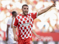 Abel Ruiz of Girona FC reacts to a missed opportunity during the La Liga EA Sports match between Sevilla FC and Girona CF at Nuevo Mirandill...