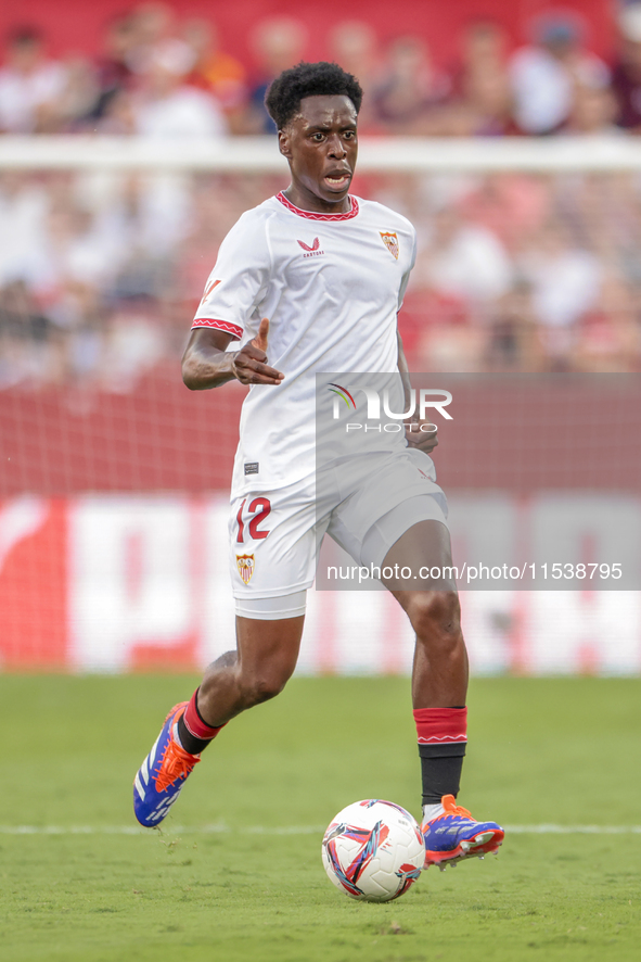 Albert Sambi Lokonga of Sevilla FC runs with the ball during the La Liga EA Sports match between Sevilla FC and Girona CF at Nuevo Mirandill...