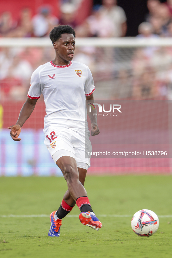 Albert Sambi Lokonga of Sevilla FC runs with the ball during the La Liga EA Sports match between Sevilla FC and Girona CF at Nuevo Mirandill...