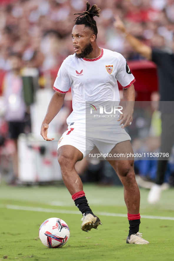 Chidera Ejuke of Sevilla FC runs with the ball during the La Liga EA Sports match between Sevilla FC and Girona CF at Nuevo Mirandilla in Se...