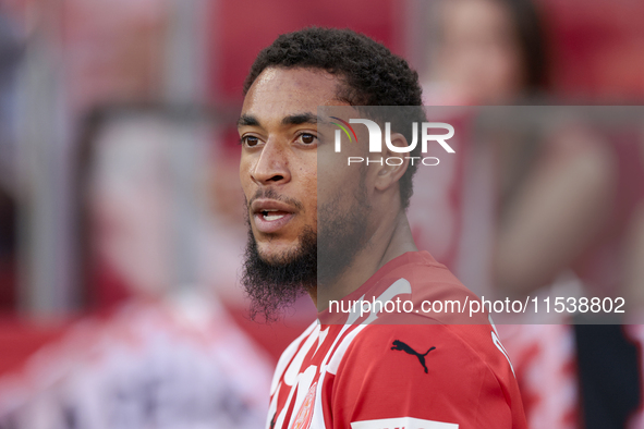 Arnau Danjuma of Girona FC is in action during the La Liga EA Sports match between Sevilla FC and Girona CF at Nuevo Mirandilla in Seville,...