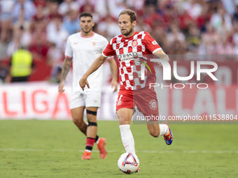 Daley Blind of Girona FC runs with the ball during the La Liga EA Sports match between Sevilla FC and Girona CF at Nuevo Mirandilla in Sevil...