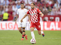 Daley Blind of Girona FC runs with the ball during the La Liga EA Sports match between Sevilla FC and Girona CF at Nuevo Mirandilla in Sevil...