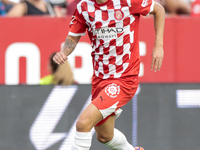 Alejandro Frances of Girona FC runs with the ball during the La Liga EA Sports match between Sevilla FC and Girona CF at Nuevo Mirandilla in...