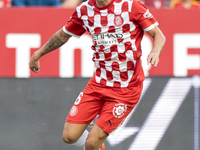 Alejandro Frances of Girona FC runs with the ball during the La Liga EA Sports match between Sevilla FC and Girona CF at Nuevo Mirandilla in...