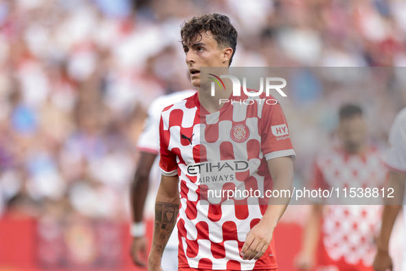 Alejandro Frances of Girona FC is in action during the La Liga EA Sports match between Sevilla FC and Girona CF at Nuevo Mirandilla in Sevil...