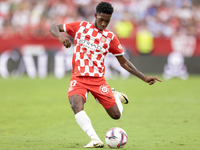 Yaser Asprilia of Girona FC makes a center to the area during the La Liga EA Sports match between Sevilla FC and Girona CF at Nuevo Mirandil...