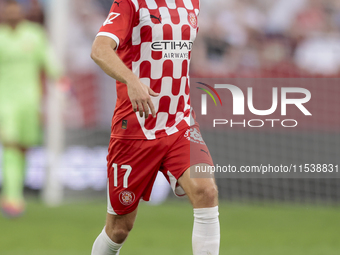 Daley Blind of Girona FC runs with the ball during the La Liga EA Sports match between Sevilla FC and Girona CF at Nuevo Mirandilla in Sevil...