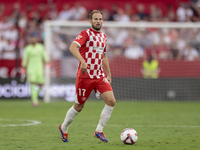 Daley Blind of Girona FC runs with the ball during the La Liga EA Sports match between Sevilla FC and Girona CF at Nuevo Mirandilla in Sevil...