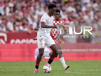 Albert Sambi Lokonga of Sevilla FC controls the ball during the La Liga EA Sports match between Sevilla FC and Girona CF at Nuevo Mirandilla...