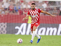 David Lopez of Girona FC passes the ball during the La Liga EA Sports match between Sevilla FC and Girona CF at Nuevo Mirandilla in Seville,...