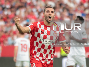 Abel Ruiz of Girona FC celebrates a goal during the La Liga EA Sports match between Sevilla FC and Girona CF at Nuevo Mirandilla in Seville,...