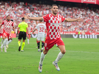 Abel Ruiz of Girona FC celebrates a goal during the La Liga EA Sports match between Sevilla FC and Girona CF at Nuevo Mirandilla in Seville,...