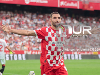 Abel Ruiz of Girona FC celebrates a goal during the La Liga EA Sports match between Sevilla FC and Girona CF at Nuevo Mirandilla in Seville,...