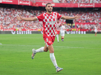 Abel Ruiz of Girona FC celebrates a goal during the La Liga EA Sports match between Sevilla FC and Girona CF at Nuevo Mirandilla in Seville,...