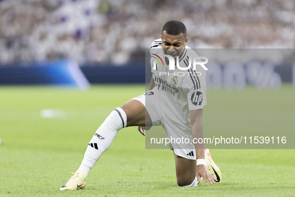 Kylian Mbappe of Real Madrid reacts to a missed opportunity during the La Liga 2024/25 match between Real Madrid and Real Betis at Santiago...