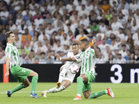 Kylian Mbappe of Real Madrid is in action during the La Liga 2024/25 match between Real Madrid and Real Betis at Santiago Bernabeu Stadium i...