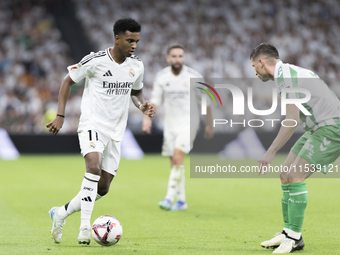 Rodrygo Goes of Real Madrid plays during the La Liga 2024/25 match between Real Madrid and Real Betis at Santiago Bernabeu Stadium in Madrid...