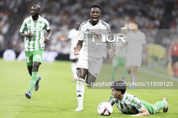 Vinicius Jr of Real Madrid is in action during the La Liga 2024/25 match between Real Madrid and Real Betis at Santiago Bernabeu Stadium in...