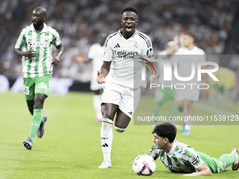 Vinicius Jr of Real Madrid is in action during the La Liga 2024/25 match between Real Madrid and Real Betis at Santiago Bernabeu Stadium in...