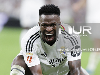 Vinicius Jr of Real Madrid reacts to a missed opportunity during the La Liga 2024/25 match between Real Madrid and Real Betis at Santiago Be...