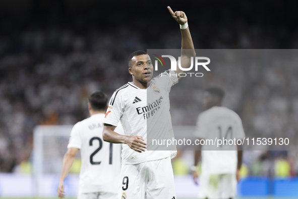 Kylian Mbappe of Real Madrid celebrates a goal during the La Liga 2024/25 match between Real Madrid and Real Betis at Santiago Bernabeu Stad...