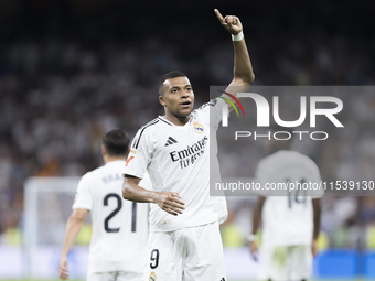 Kylian Mbappe of Real Madrid celebrates a goal during the La Liga 2024/25 match between Real Madrid and Real Betis at Santiago Bernabeu Stad...