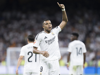 Kylian Mbappe of Real Madrid celebrates a goal during the La Liga 2024/25 match between Real Madrid and Real Betis at Santiago Bernabeu Stad...