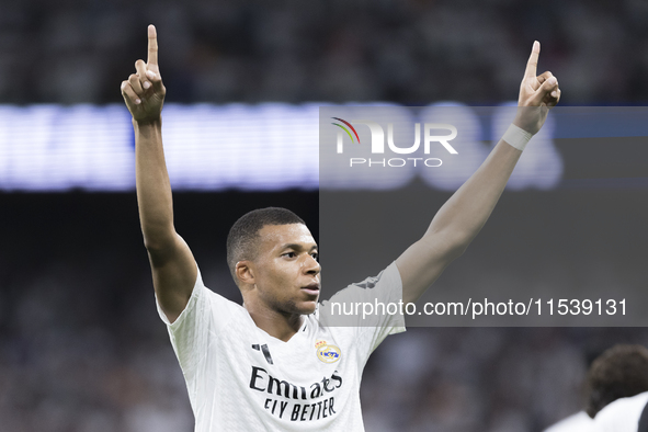 Kylian Mbappe of Real Madrid celebrates a goal during the La Liga 2024/25 match between Real Madrid and Real Betis at Santiago Bernabeu Stad...