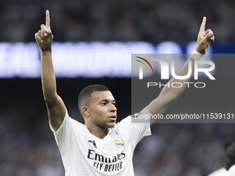 Kylian Mbappe of Real Madrid celebrates a goal during the La Liga 2024/25 match between Real Madrid and Real Betis at Santiago Bernabeu Stad...