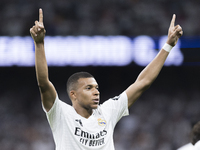 Kylian Mbappe of Real Madrid celebrates a goal during the La Liga 2024/25 match between Real Madrid and Real Betis at Santiago Bernabeu Stad...