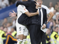 Real Madrid coach Carlo Ancelotti and Kylian Mbappe of Real Madrid hug each other during the La Liga 2024/25 match between Real Madrid and R...