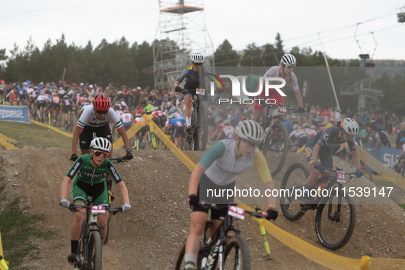 Cyclists participate in the UCI Mountain Bike World Championships Women in Pal Arinsal, Andorra, on September 1, 2024. 