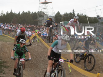 Cyclists participate in the UCI Mountain Bike World Championships Women in Pal Arinsal, Andorra, on September 1, 2024. (