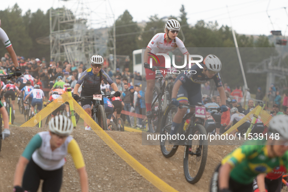 Cyclists participate in the UCI Mountain Bike World Championships Women in Pal Arinsal, Andorra, on September 1, 2024. 