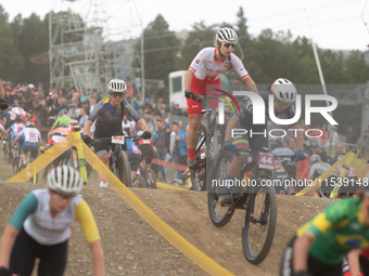 Cyclists participate in the UCI Mountain Bike World Championships Women in Pal Arinsal, Andorra, on September 1, 2024. (