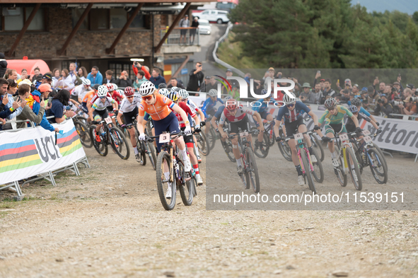 Cyclists participate in the UCI Mountain Bike World Championships Women in Pal Arinsal, Andorra, on September 1, 2024. 