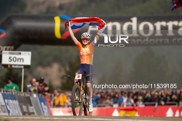 Puck Pieterse of Nederland crosses the finish line in the UCI Mountain Bike World Championships Women in Pal Arinsal, Andorra, on September...