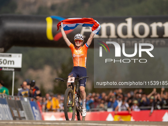 Puck Pieterse of Nederland crosses the finish line in the UCI Mountain Bike World Championships Women in Pal Arinsal, Andorra, on September...