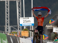 Puck Pieterse of Nederland crosses the finish line in the UCI Mountain Bike World Championships Women in Pal Arinsal, Andorra, on September...