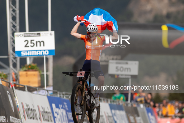 Puck Pieterse of Nederland crosses the finish line in the UCI Mountain Bike World Championships Women in Pal Arinsal, Andorra, on September...