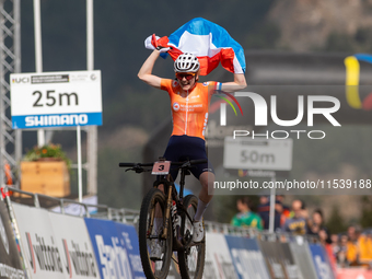 Puck Pieterse of Nederland crosses the finish line in the UCI Mountain Bike World Championships Women in Pal Arinsal, Andorra, on September...